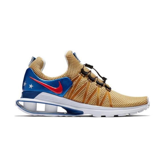 nike shox gravity metallic gold